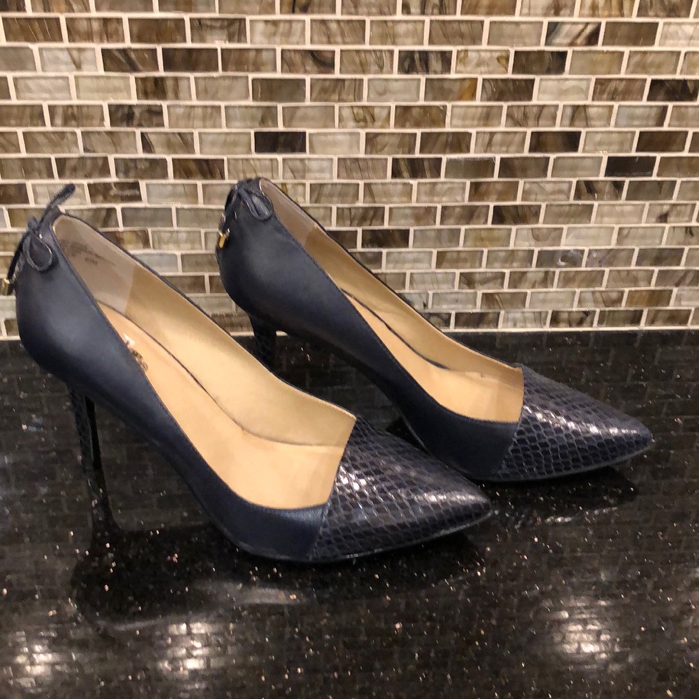 Never Worn Coach and Four Navy heels Size 8.5